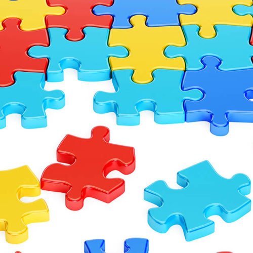 Puzzle Pieces in Autism Awareness Colors, 3D rendering isolated on white background